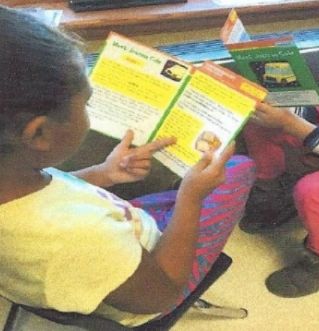 A Clifton student reading