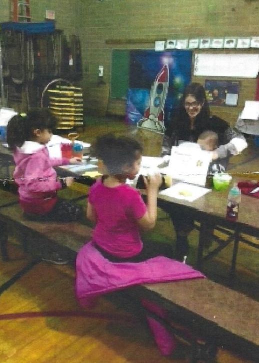 Children crafting at a table
